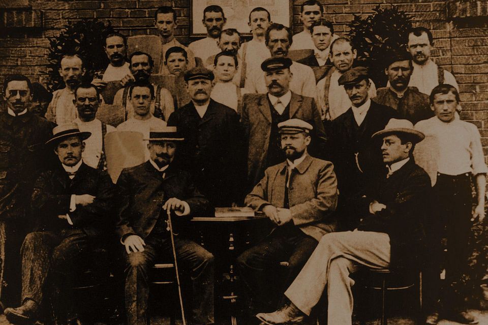 Historical photograph of a group of men and IREKS company founder Johann Peter Ruckdeschel