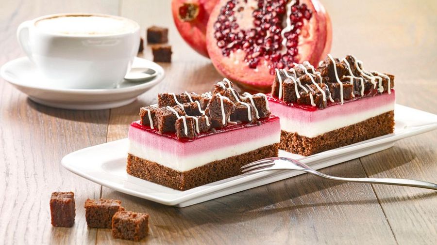 Vegan mini chocolate plain cakes arranged on a plate